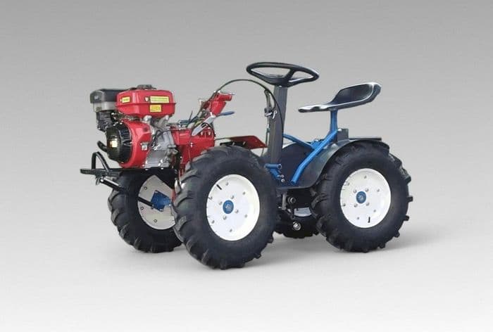 Минитрактор с навесным оборудованием и прицепом